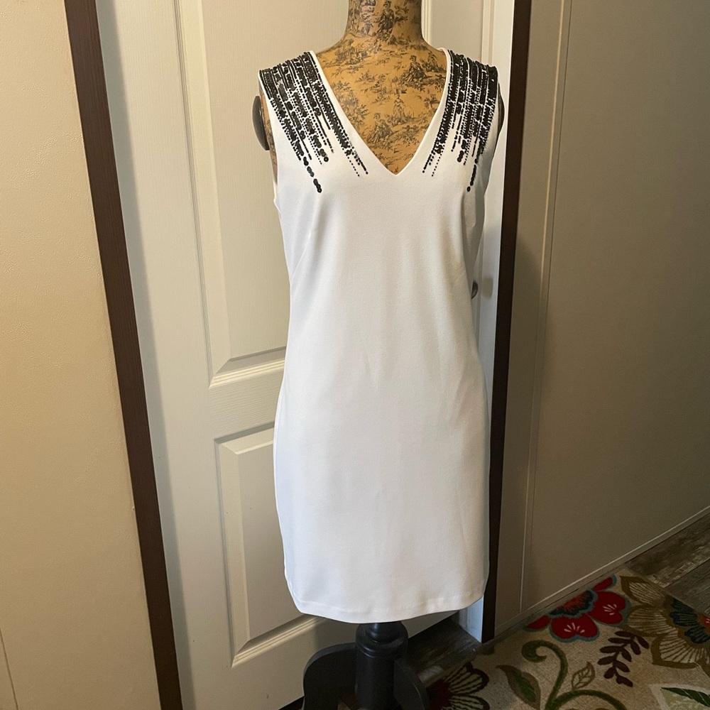 White House Black Market White dress with black sequined detail